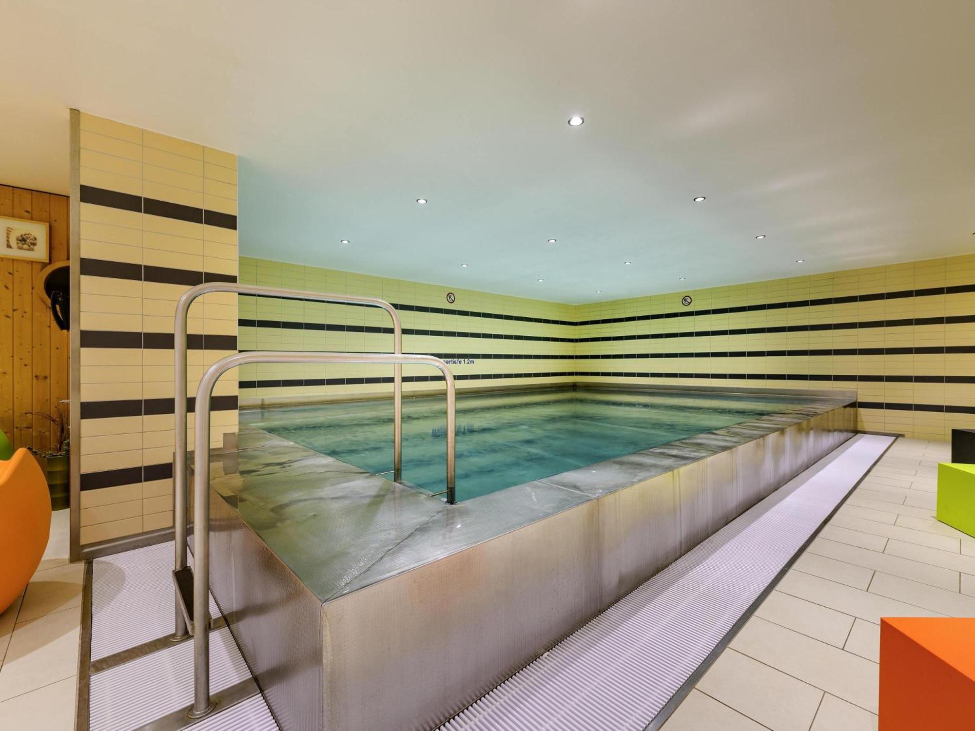 Staying Near Lichtburg-Filmpalast: 2 Design Hotels Compared